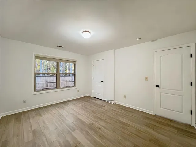 an empty room with windows