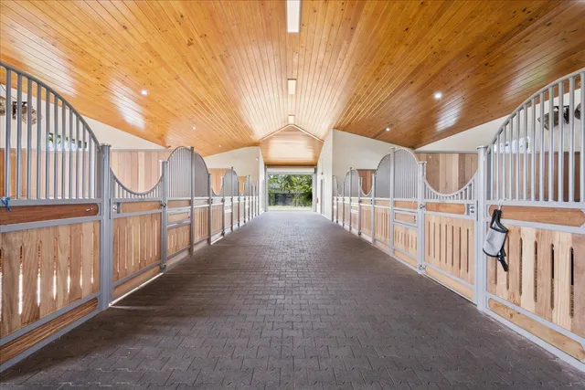 a view of a hallway with windows
