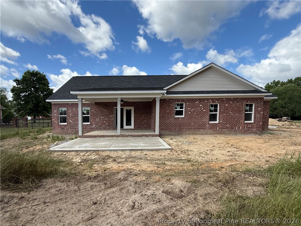 132 Ridge Stone Drive Autryville, NC 28318 - Photo 24 of 26 front view of a house with a yard