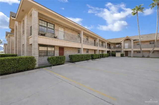 a view of a building with a street