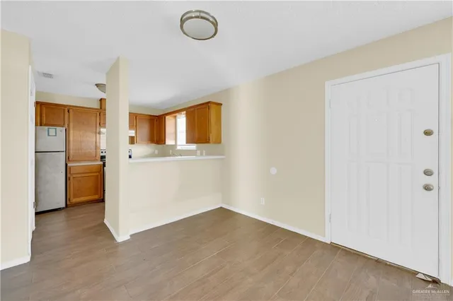 a view of a kitchen with a sink