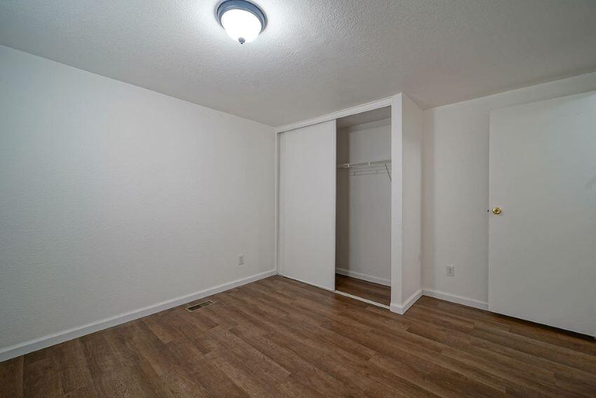 1291 Red Hill Road Junction City, CA 96048 - Photo 16 of 24 a view of an empty room with wooden floor and closet