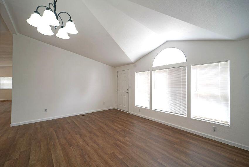 1291 Red Hill Road Junction City, CA 96048 - Photo 2 of 24 an empty room with wooden floor and windows