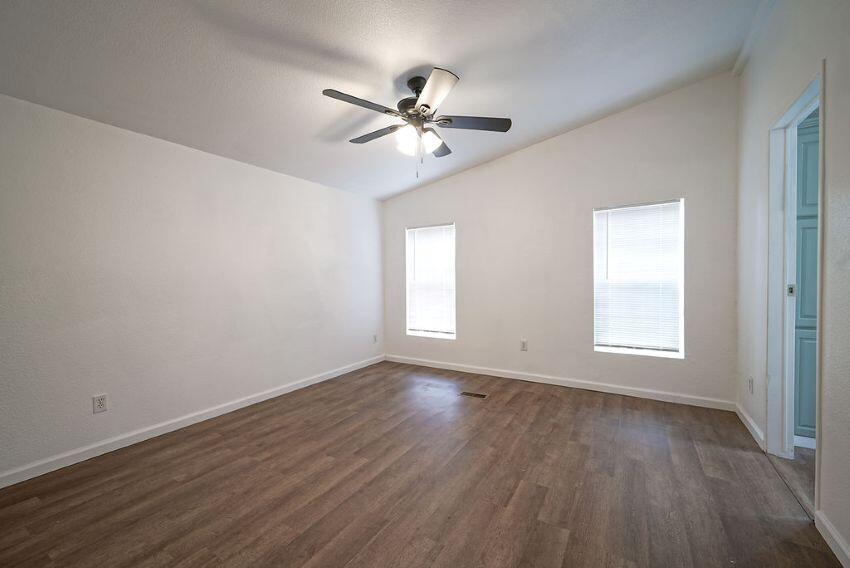 1291 Red Hill Road Junction City, CA 96048 - Photo 21 of 24 a view of an empty room with wooden floor and a window