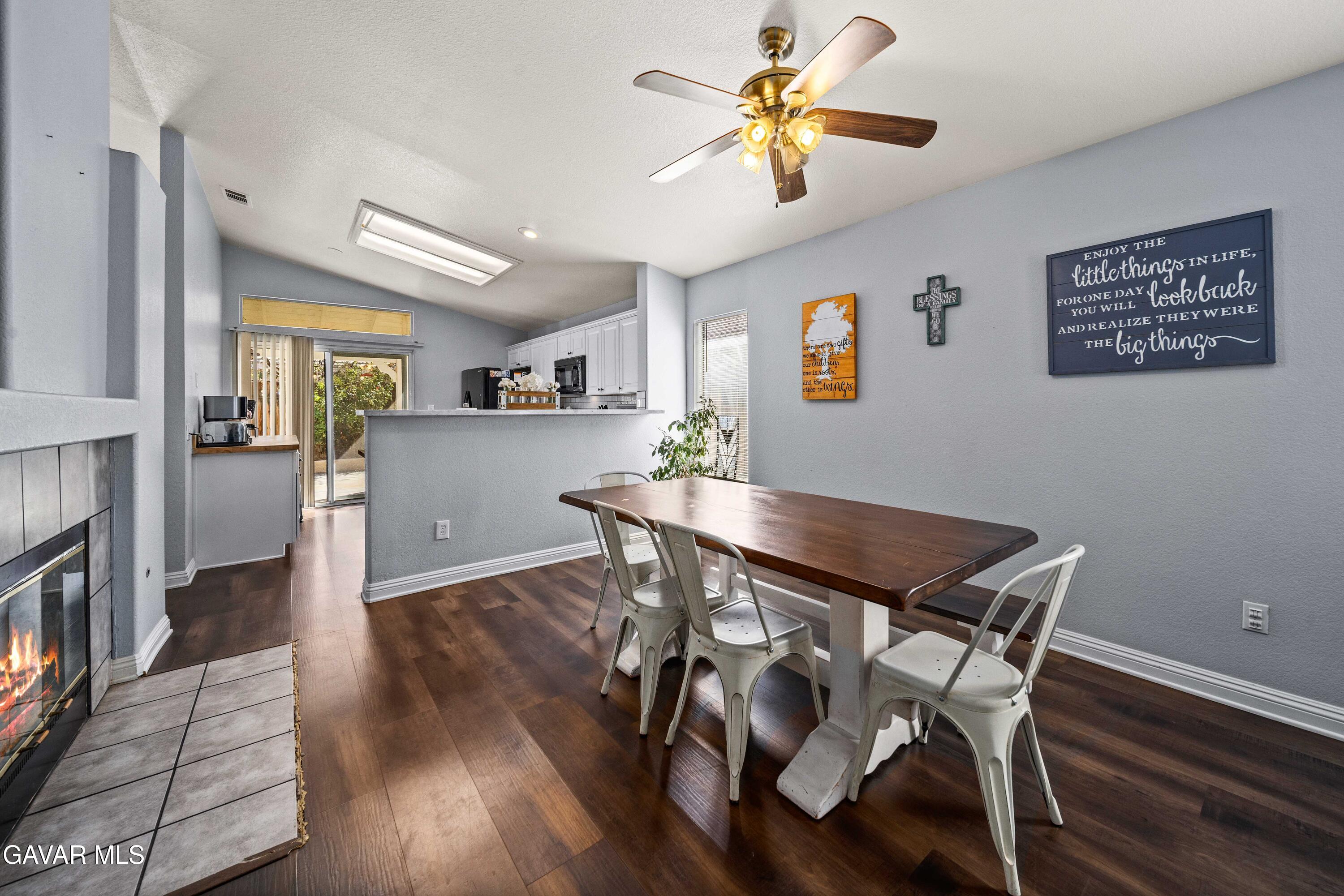 45736 Victoria Avenue Lancaster, CA 93534 - Photo 15 of 30 a view of a dining room with furniture and wooden floor