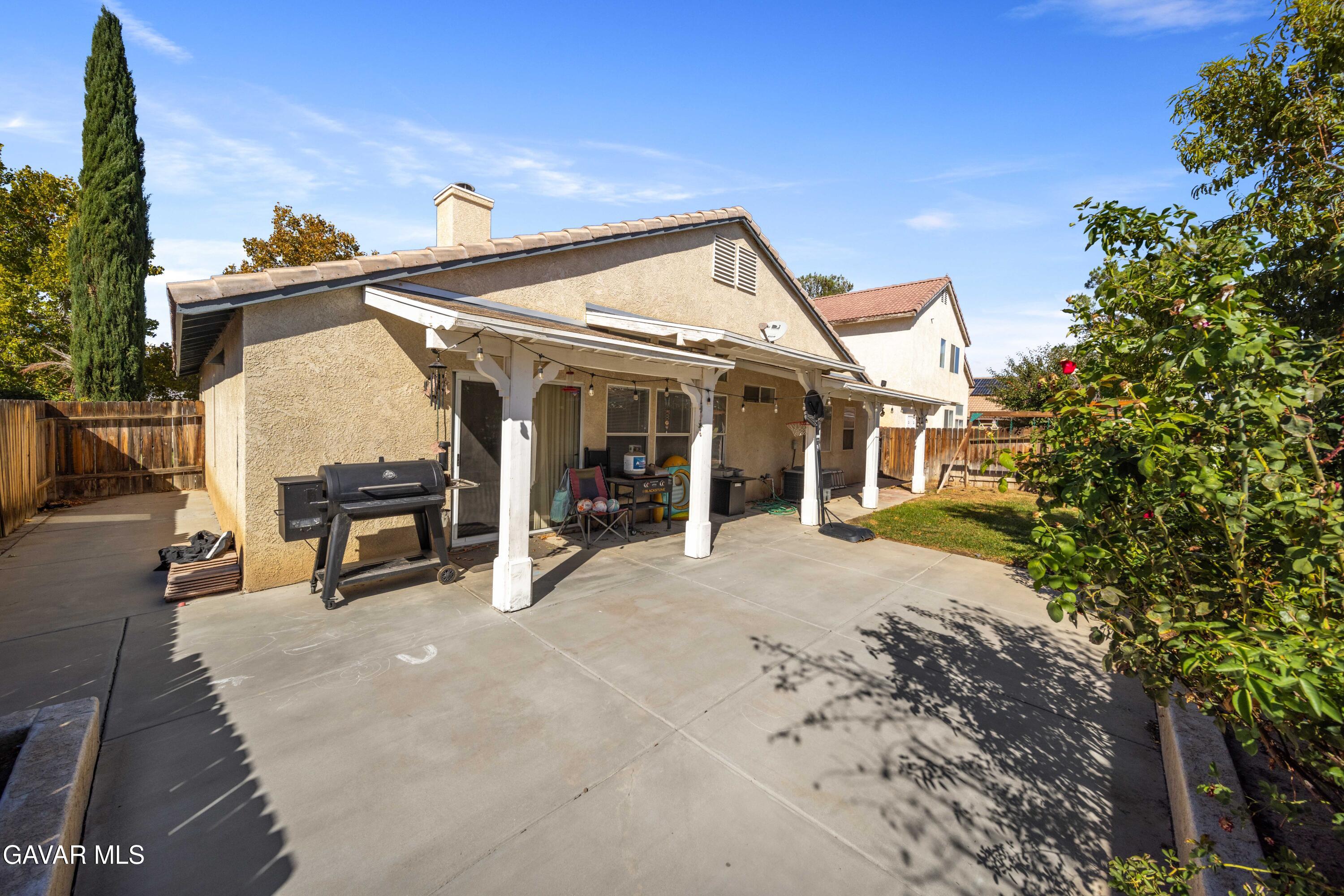 45736 Victoria Avenue Lancaster, CA 93534 - Photo 26 of 30 a view of a house with a patio