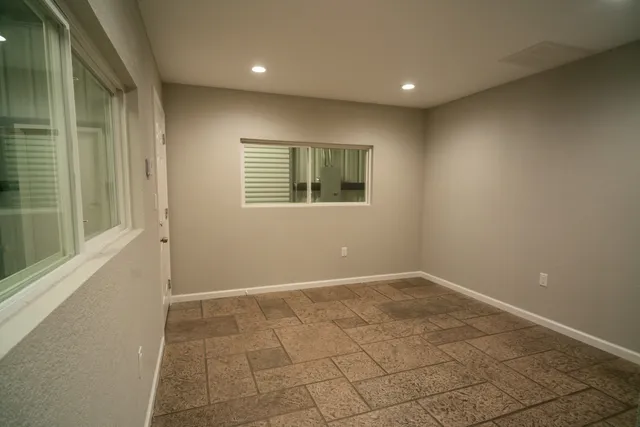 an empty room with windows