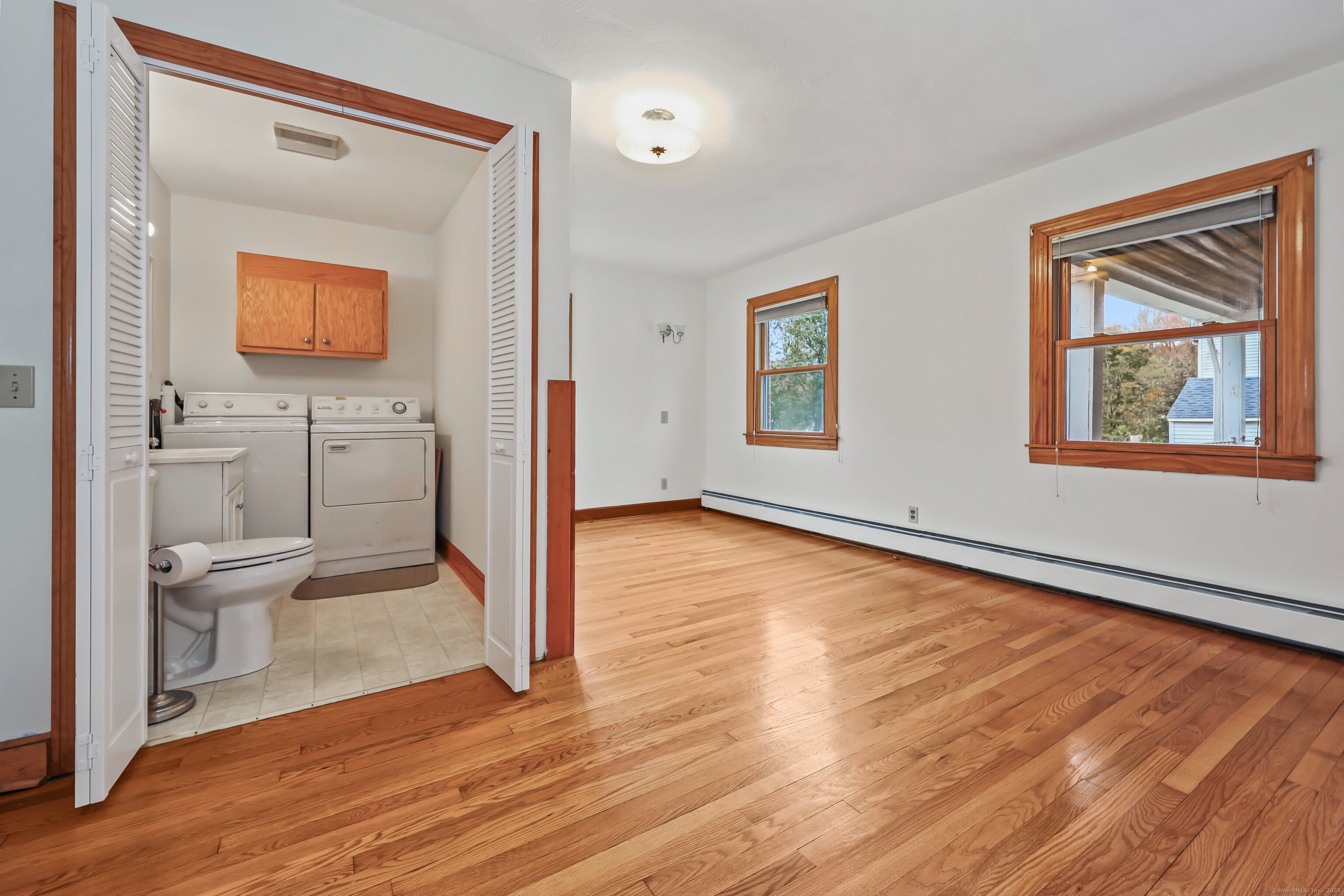 9 Sunset Drive Middlefield, CT 06481 - Photo 17 of 40 a bathroom with a toilet sink and mirror