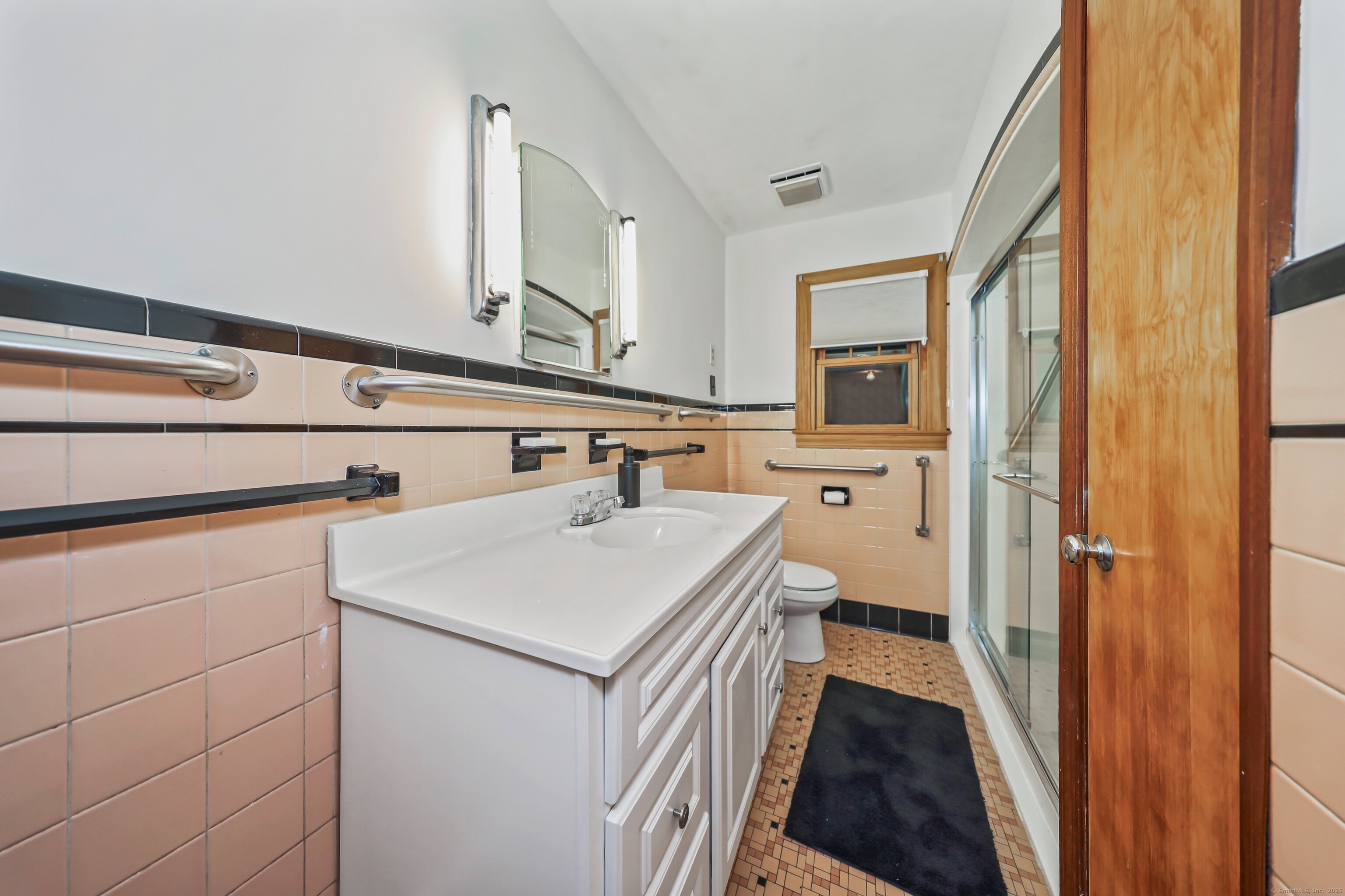 9 Sunset Drive Middlefield, CT 06481 - Photo 22 of 40 a bathroom with a sink a toilet and a mirror
