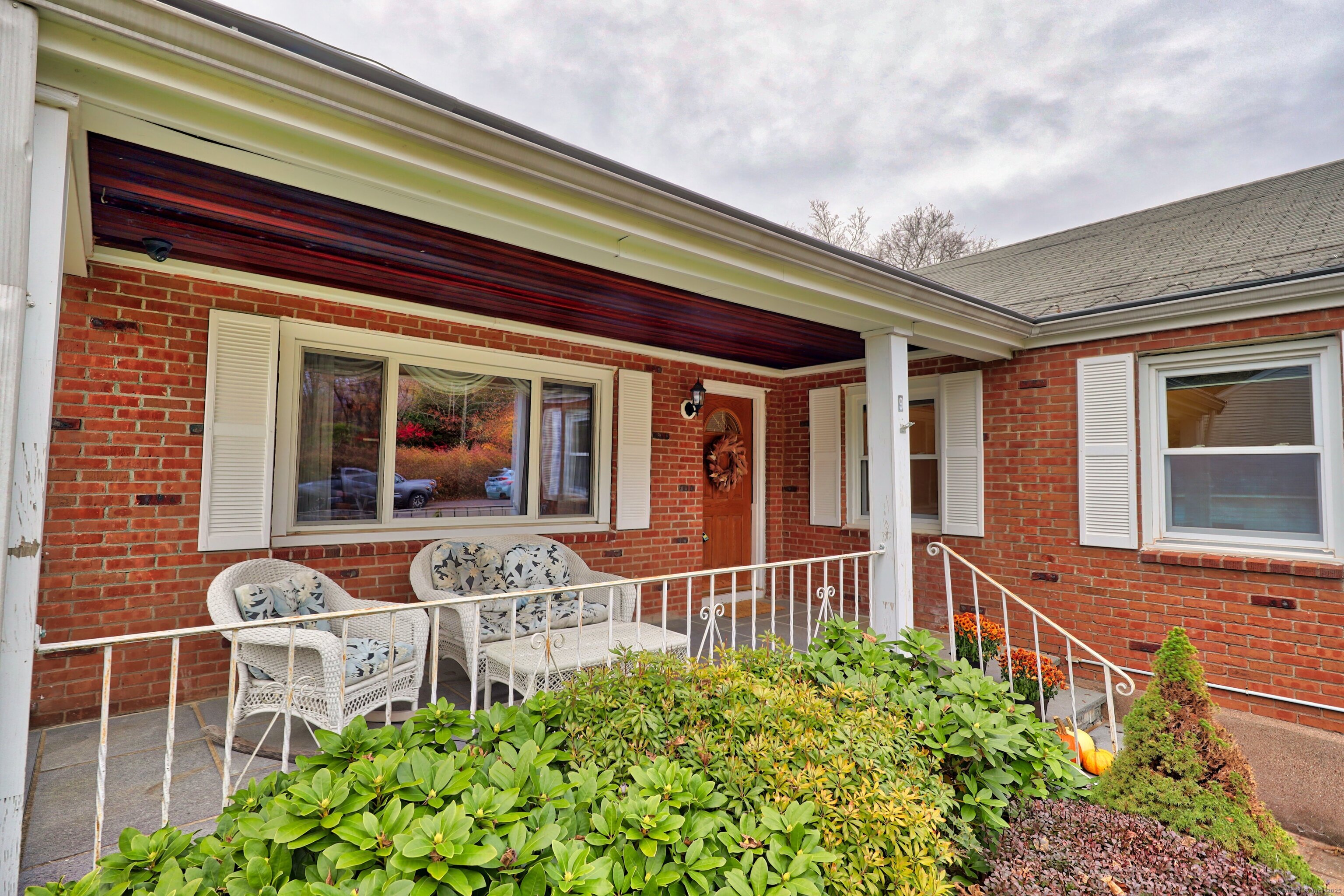 9 Sunset Drive Middlefield, CT 06481 - Photo 38 of 40 a front view of a house with a porch