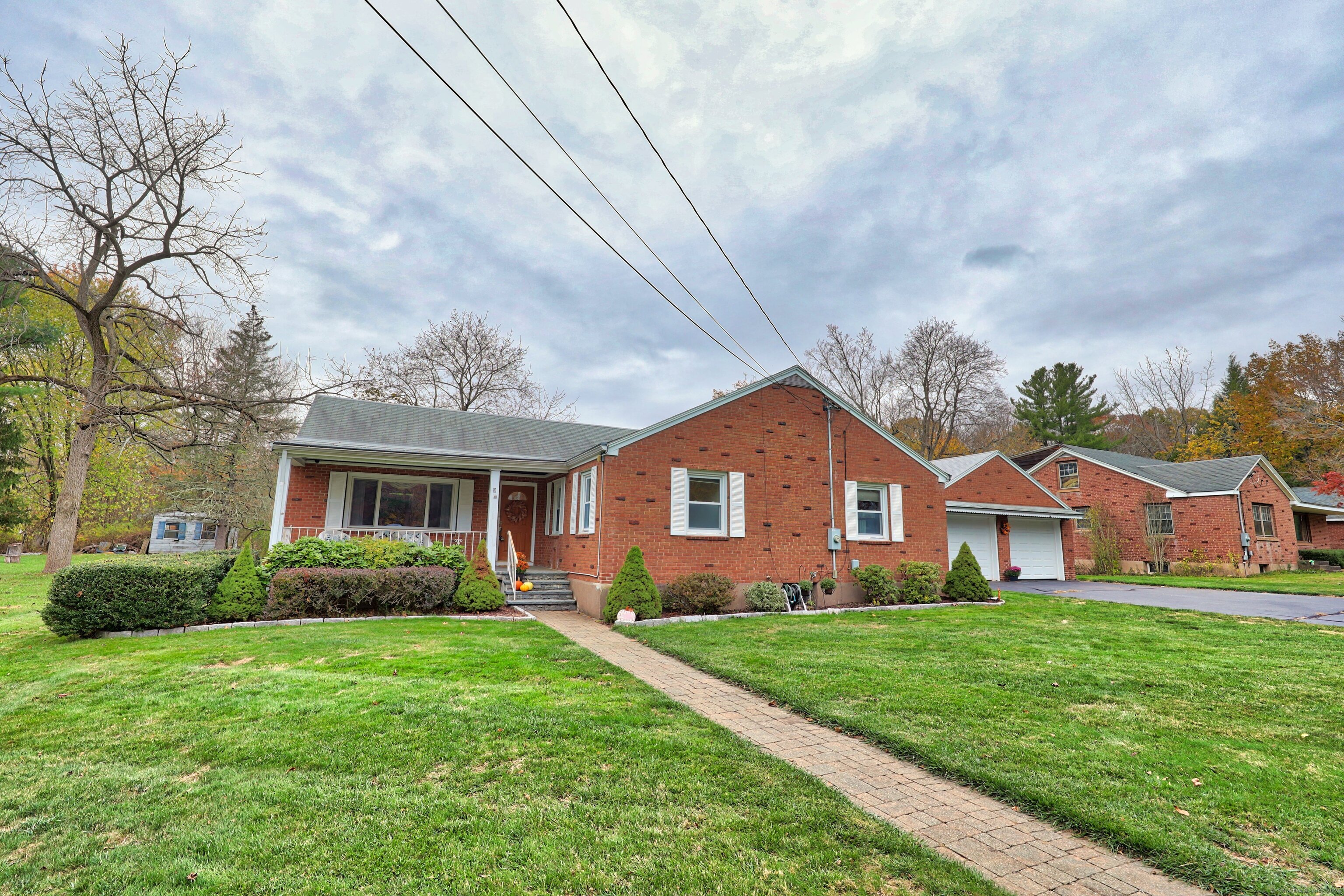 9 Sunset Drive Middlefield, CT 06481 - Photo 39 of 40 a front view of house with yard and green space