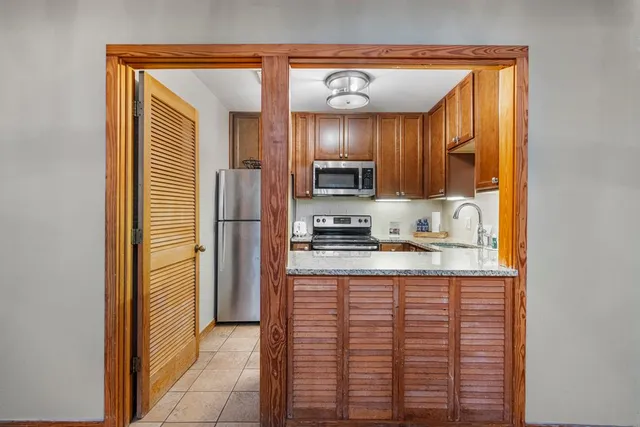 a bathroom with a mirror and a sink