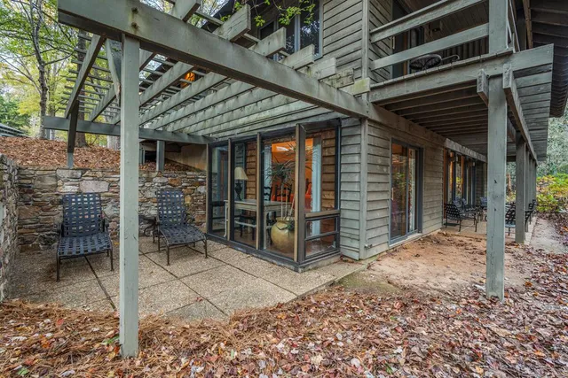 a view of balcony with furniture