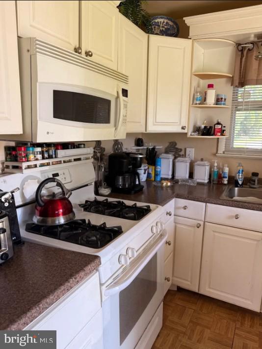 Charming kitchen with modern amenities.