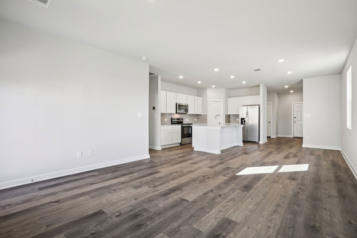 148 Cutleaf San Marcos, TX 78666 - Photo 17 of 34 a view of kitchen with wooden floor