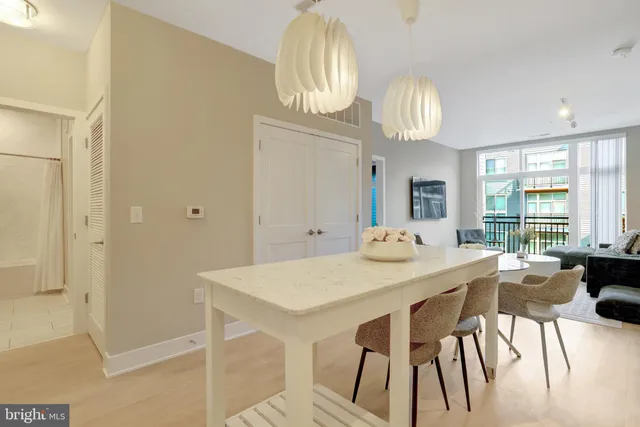 a view of a dining room with furniture window and outside view