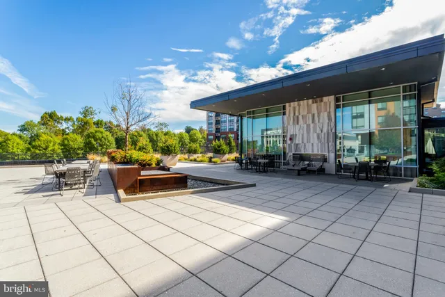a view of a swimming pool with a lounge chairs
