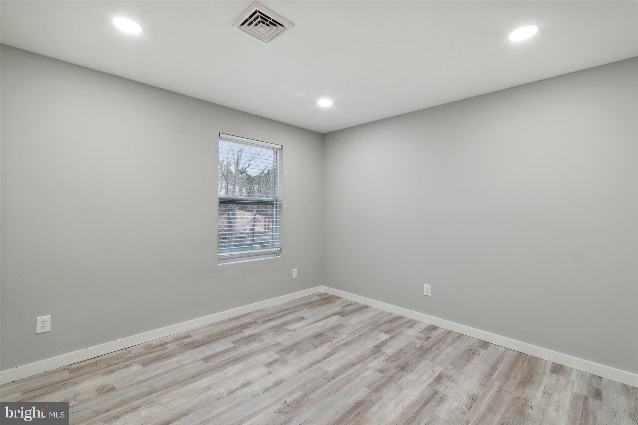 113 Kresson Gibbsboro Road, Unit 2 Voorhees, NJ 08043 - Photo 12 of 25 a view of empty room with wooden floor and fan