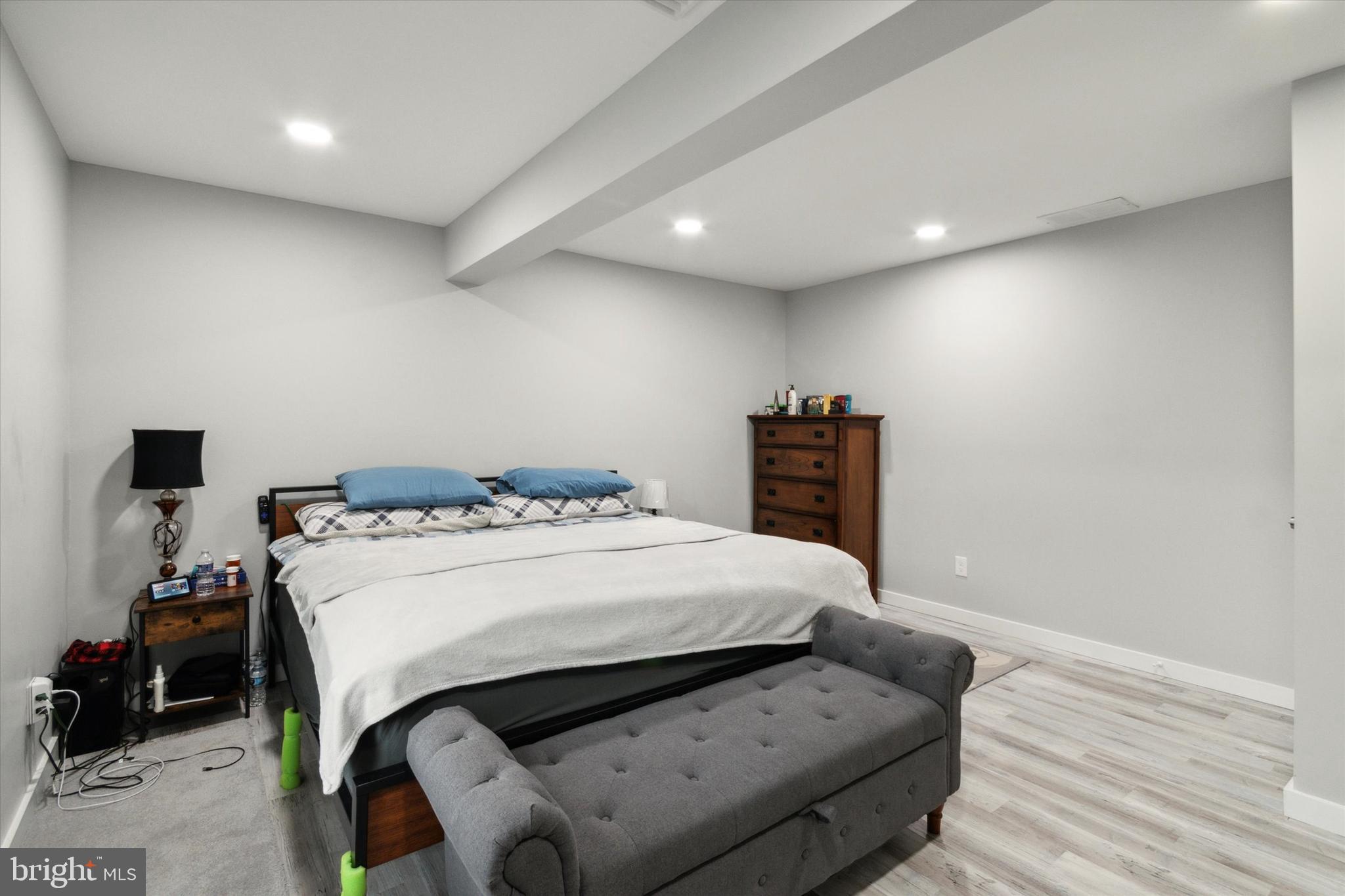 113 Kresson Gibbsboro Road, Unit 2 Voorhees, NJ 08043 - Photo 19 of 25 a bedroom with a bed and wooden floor