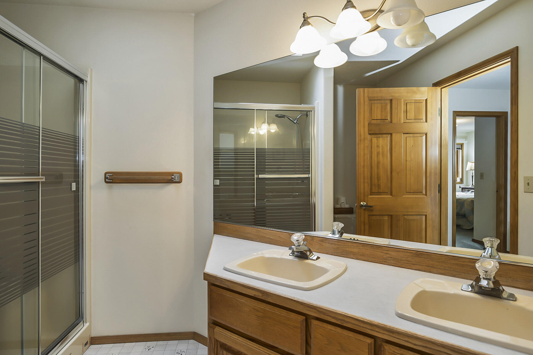 3808 Northwest Summerfield Road Bend, OR 97703 - Photo 38 of 38 Full bathroom upstairs with dual vanity.