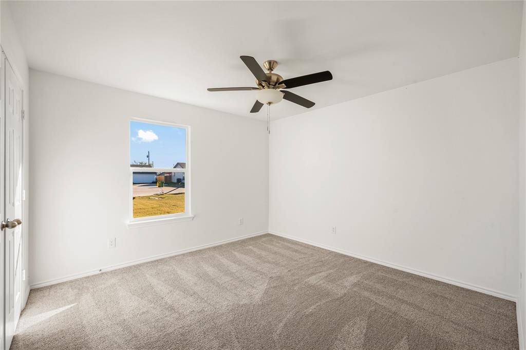 437 Whitney Court Rio Vista, TX 76093 - Photo 13 of 21 a view of an empty room and a window