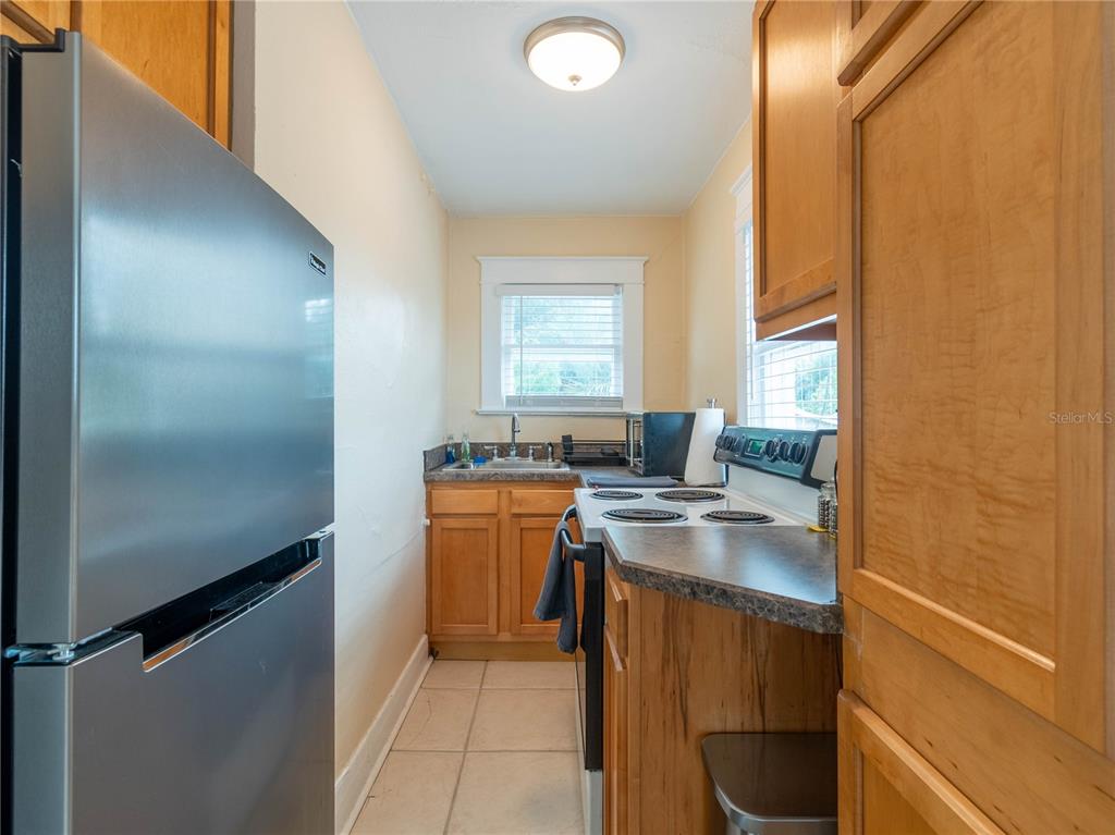 103 East Mohawk Avenue, Unit A Tampa, FL 33604 - Photo 11 of 19 a room with storage and utility