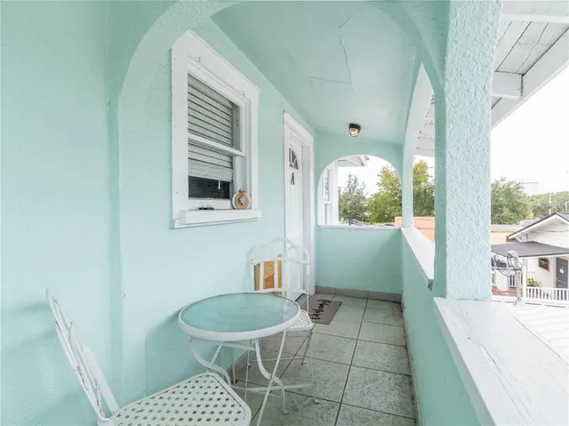 a bathroom with a sink a toilet and a shower