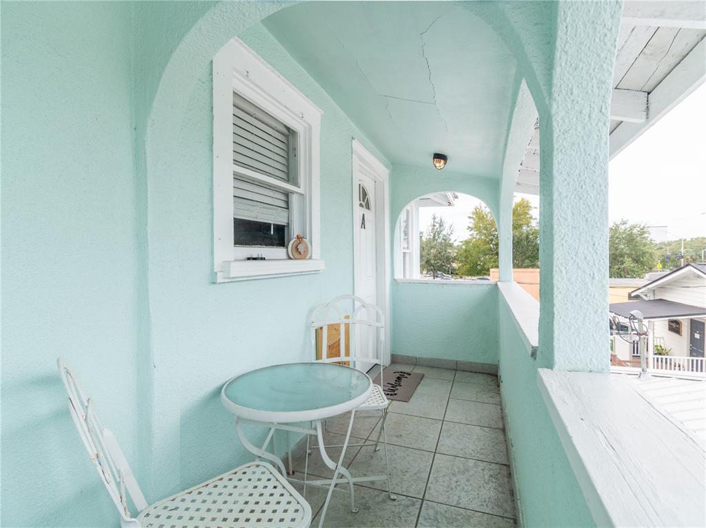 103 East Mohawk Avenue, Unit A Tampa, FL 33604 - Photo 3 of 19 a bathroom with a sink a toilet and a shower