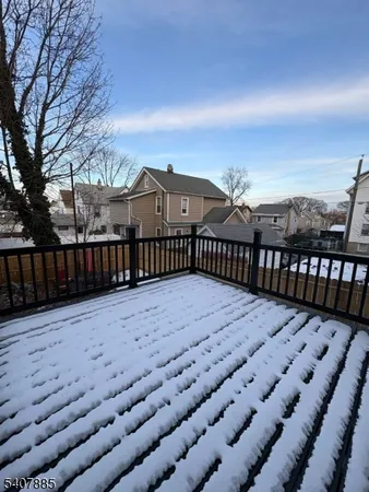 a view of a terrace with trees