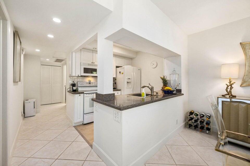 250 Northeast 20th Street, Unit 1010 Boca Raton, FL 33431 - Photo 5 of 23 opened to dining/living area