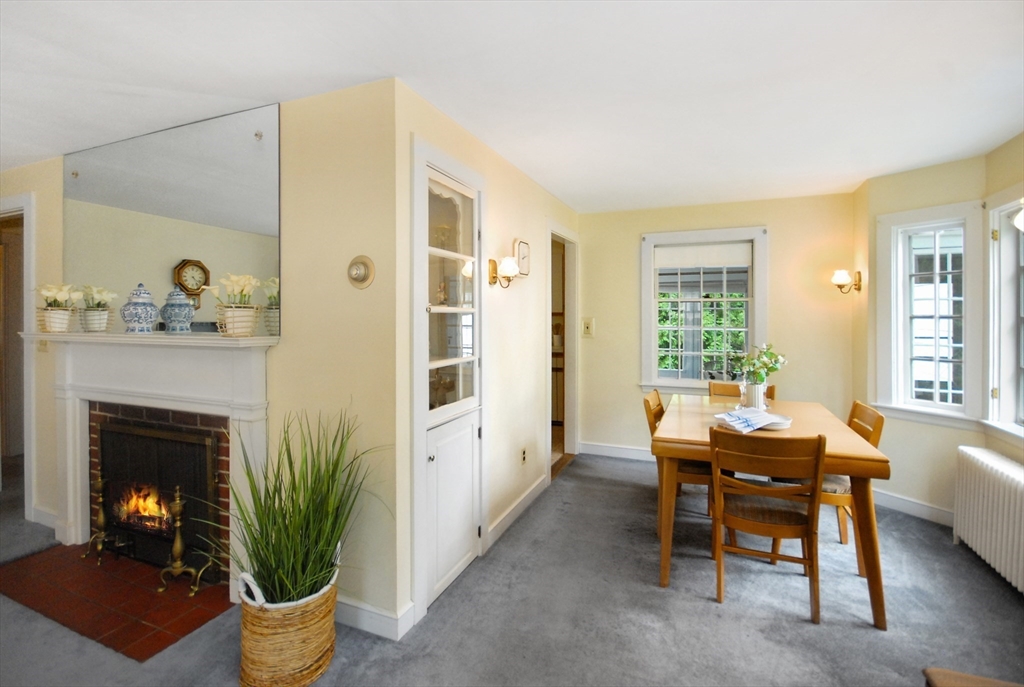 3 Sherburne Road Lexington, MA 02421 - Photo 13 of 42 a view of a livingroom with furniture and a fireplace