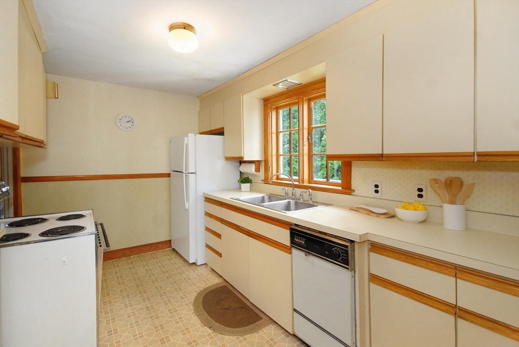 3 Sherburne Road Lexington, MA 02421 - Photo 18 of 42 a utility room with cabinets washer and dryer