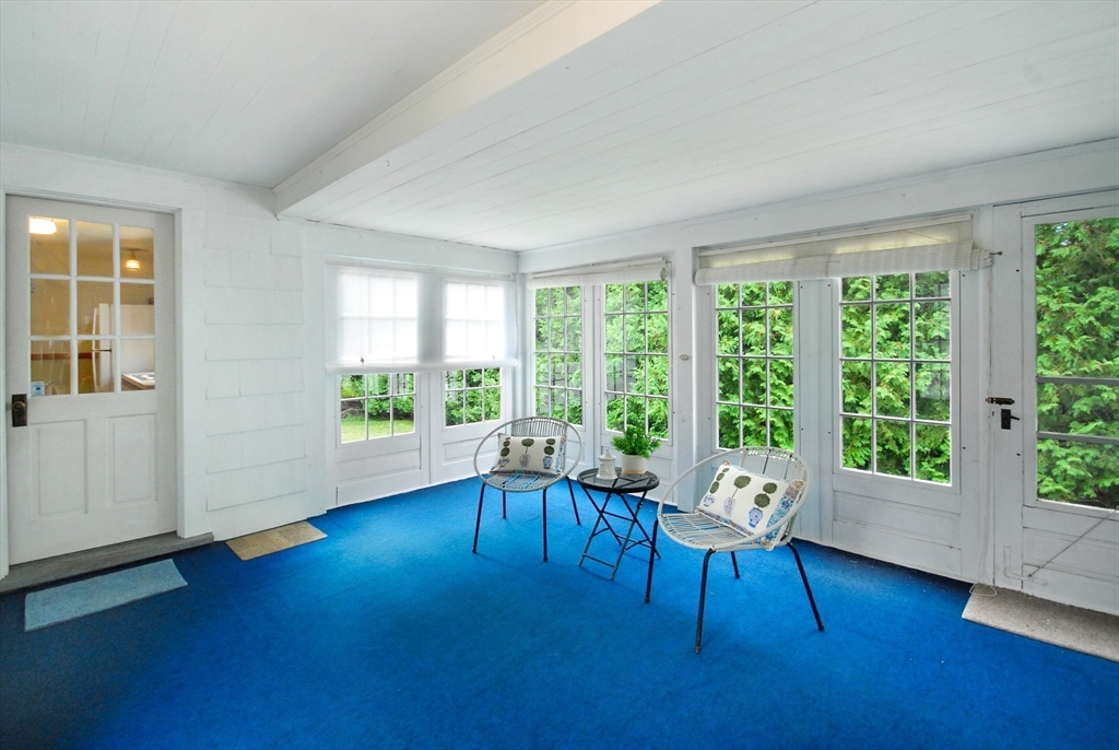 3 Sherburne Road Lexington, MA 02421 - Photo 21 of 42 a living room with furniture and a large window