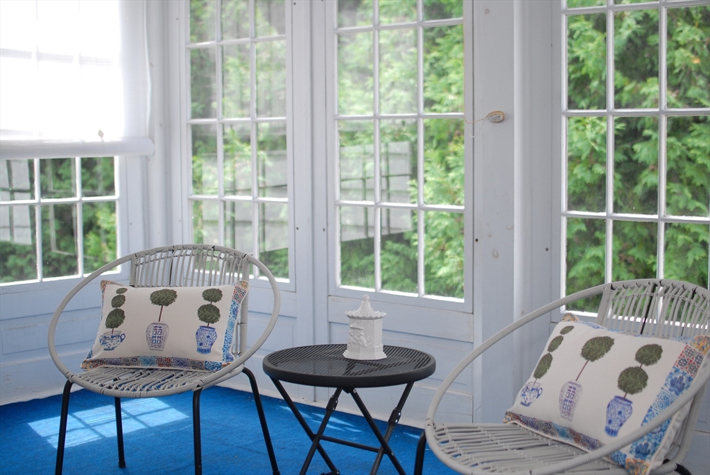 3 Sherburne Road Lexington, MA 02421 - Photo 22 of 42 a living room with furniture and a window