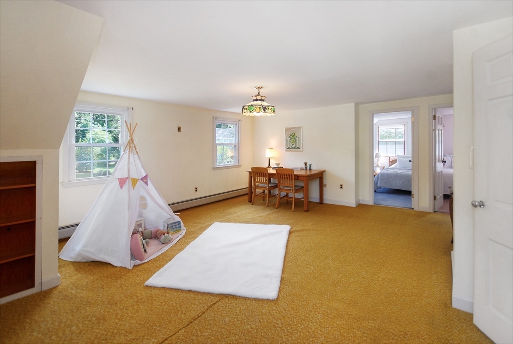 3 Sherburne Road Lexington, MA 02421 - Photo 28 of 42 a room with window and a table