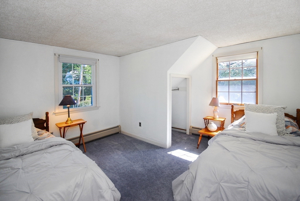 3 Sherburne Road Lexington, MA 02421 - Photo 32 of 42 a bedroom with furniture and window