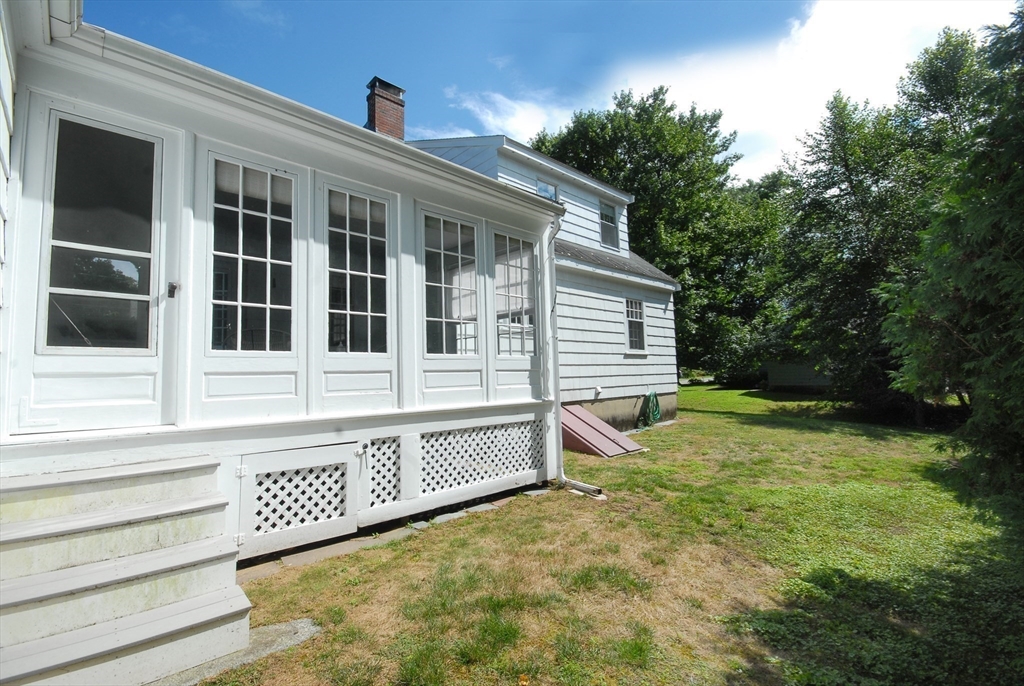 3 Sherburne Road Lexington, MA 02421 - Photo 38 of 42 a view of a house with backyard and sitting area