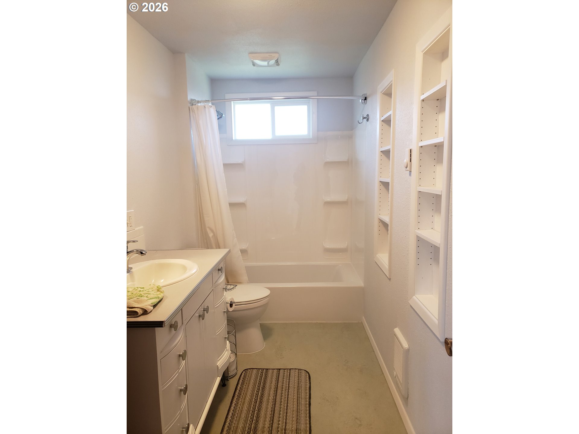 1441 West Main Street Molalla, OR 97038 - Photo 14 of 24 a bathroom with a sink a toilet and shower