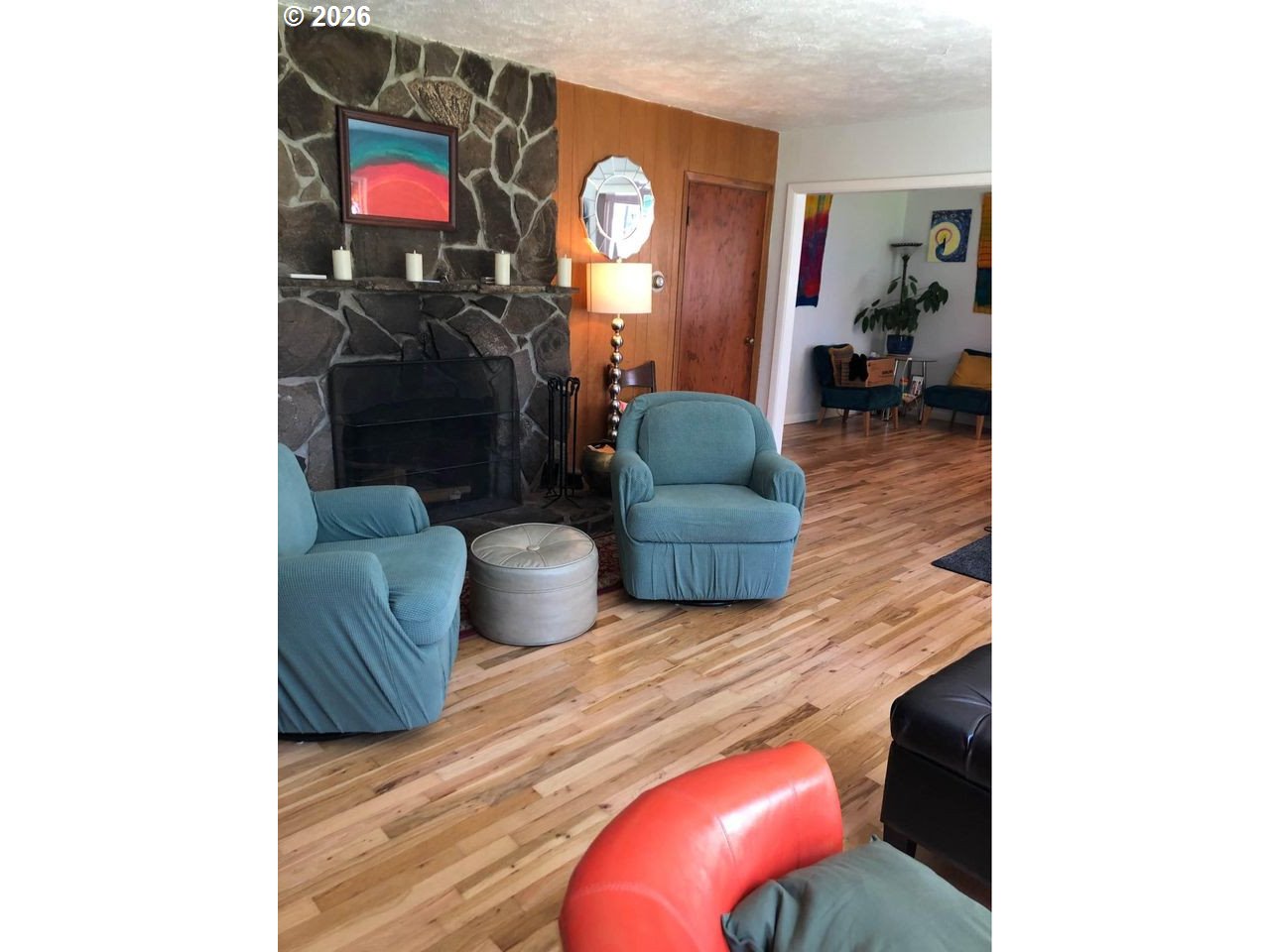 1441 West Main Street Molalla, OR 97038 - Photo 16 of 24 a living room with furniture and a fireplace