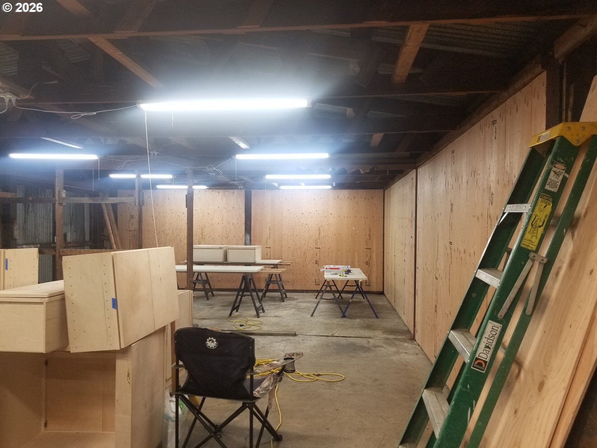 1441 West Main Street Molalla, OR 97038 - Photo 20 of 24 a living room with lots of furniture and a large window
