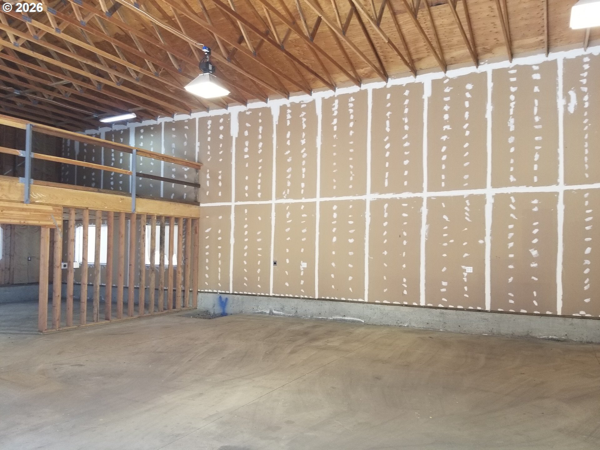 1441 West Main Street Molalla, OR 97038 - Photo 5 of 24 a view of an empty room with windows