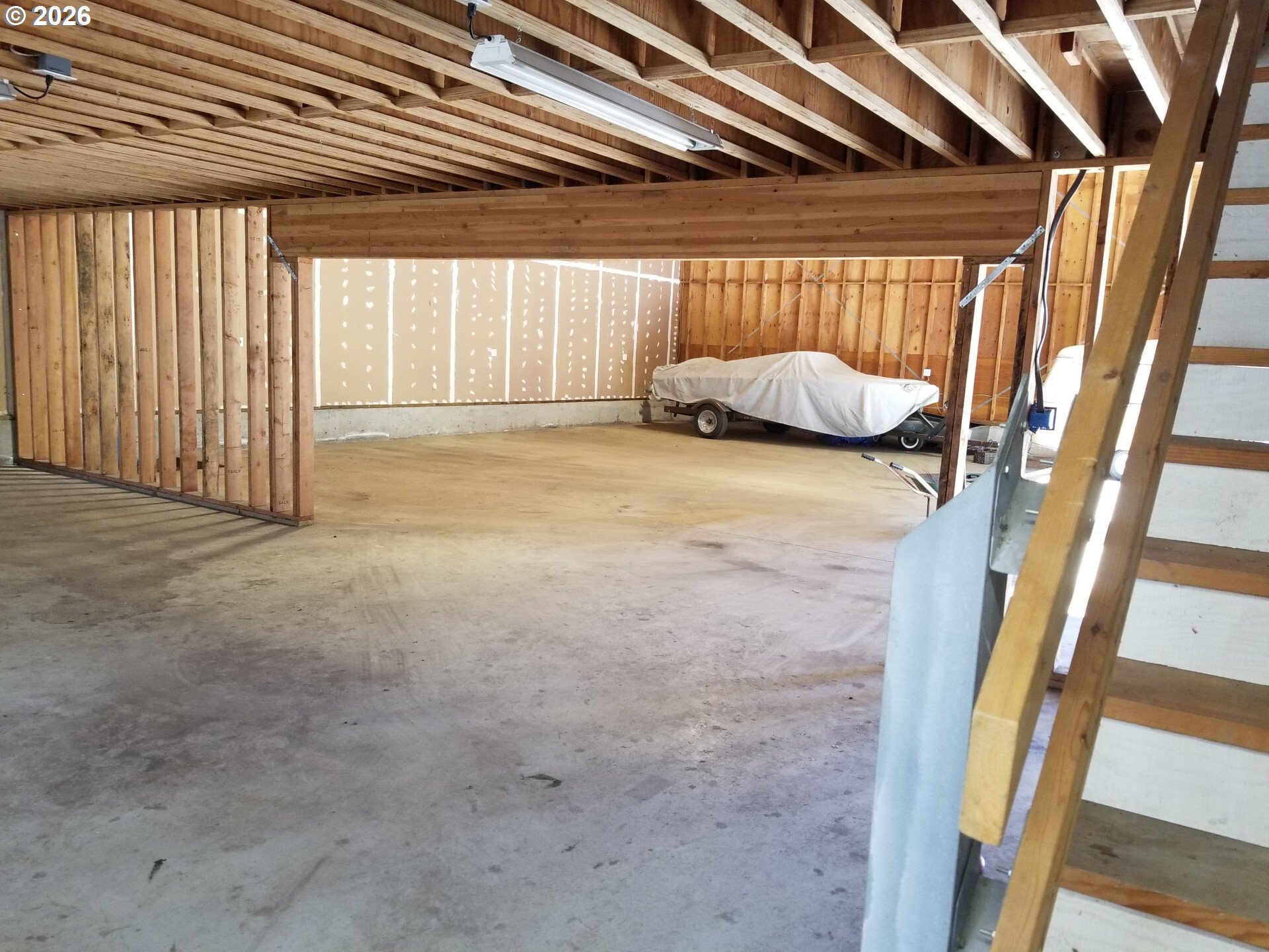 1441 West Main Street Molalla, OR 97038 - Photo 6 of 24 a view of walk in closet with clothes and shoes