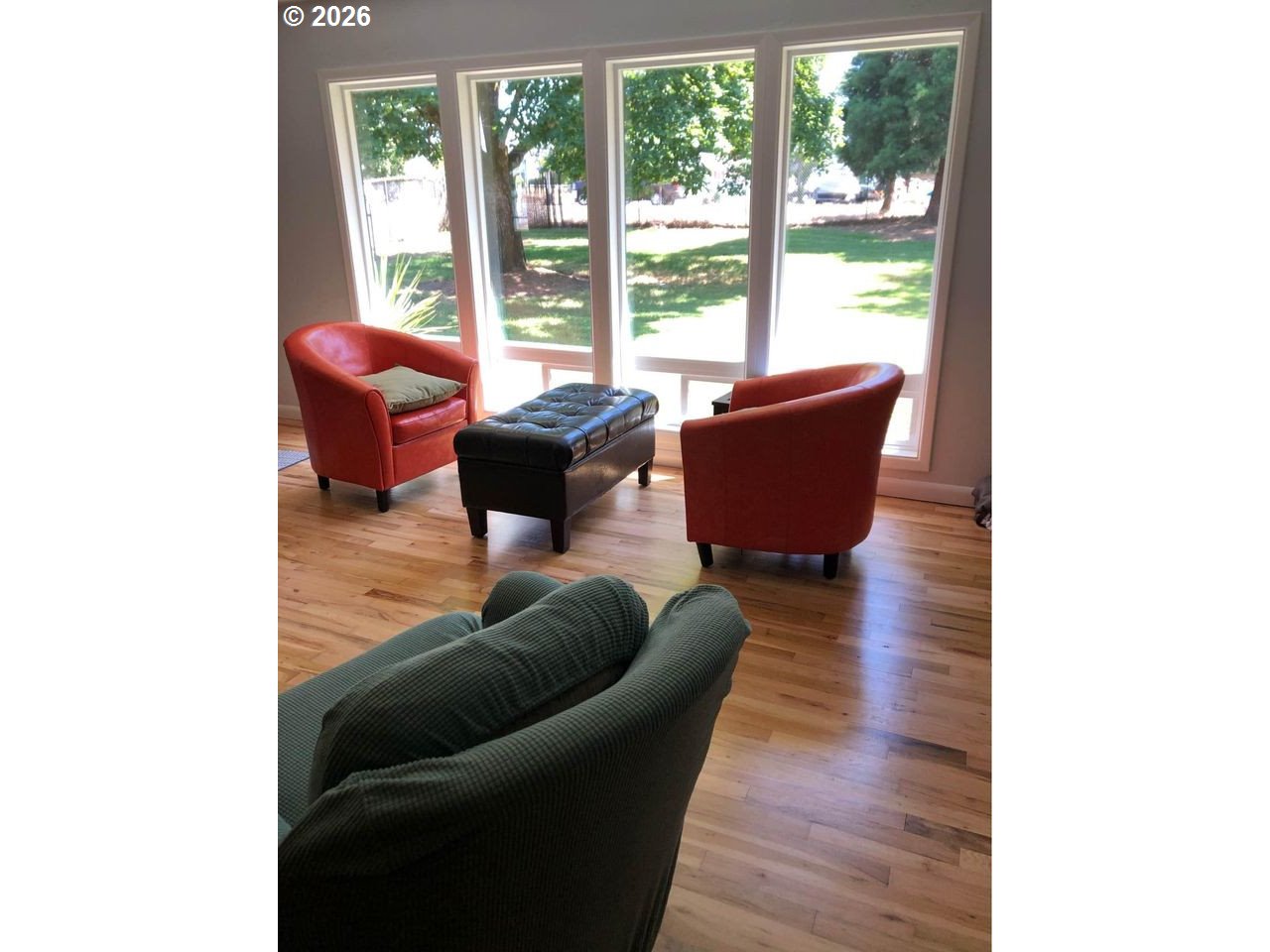 1441 West Main Street Molalla, OR 97038 - Photo 9 of 24 a living room with furniture and a large window