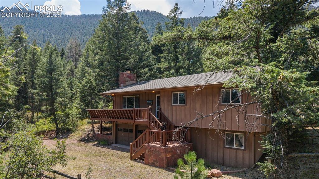 5580 Moosa Road Cascade, CO 80809 - Photo 2 of 35 an aerial view of a house