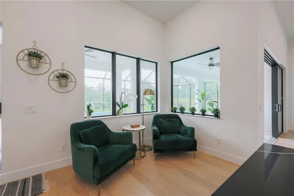a living room with furniture and a window