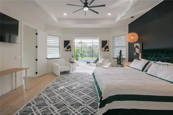 a bedroom with a bed and window
