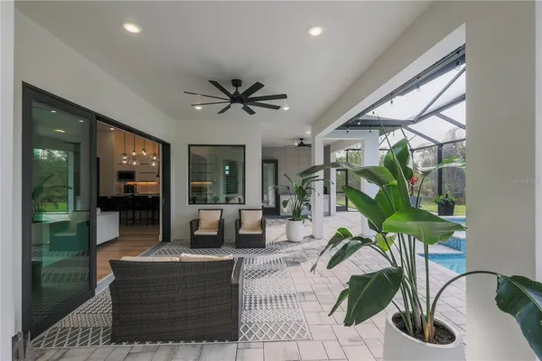a living room with patio furniture