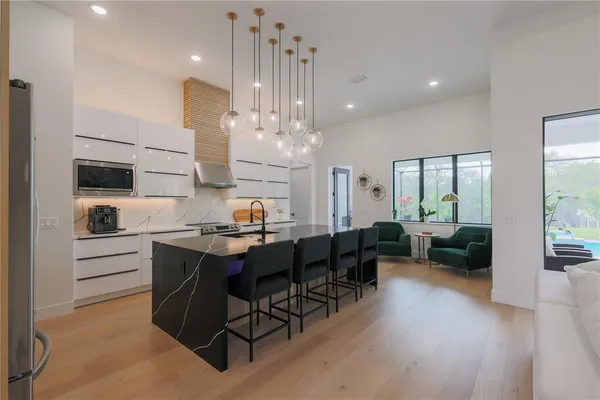 a large kitchen with cabinets
