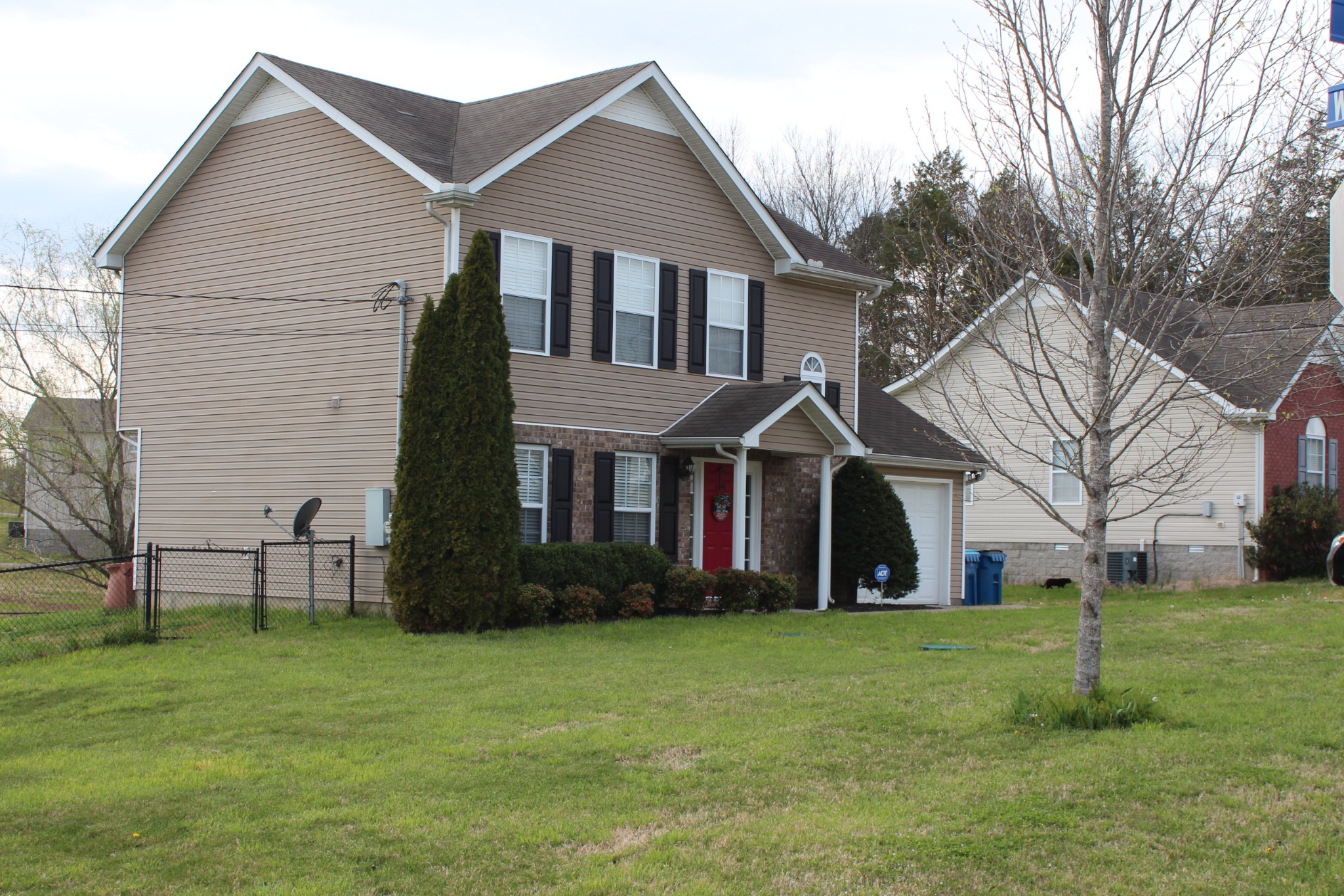 105 Cataract Drive Murfreesboro, TN 37129 - Photo 2 of 8 a front view of house with yard and green space