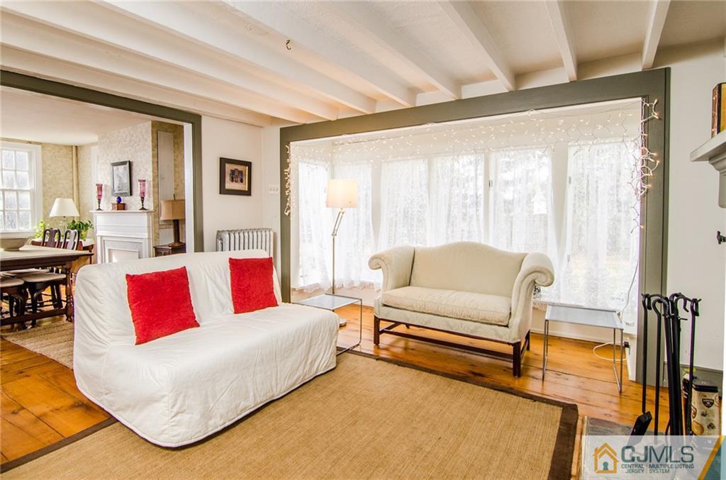 168 Plainsboro Road Cranbury, NJ 08512 - Photo 14 of 25 a living room with furniture and a large window